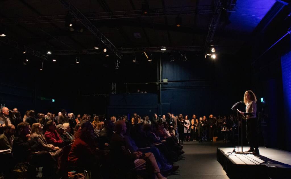 Director of the Arts Council Maureen Kennelly speaks to the crowd at the Meet the Arts Council event at the Complex